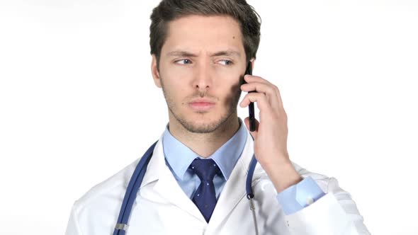 Young Doctor Talking on Smartphone White Background