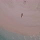 Girl on an empty beach - TOP VIEW - VideoHive Item for Sale