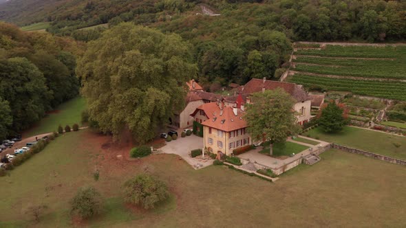 Aerial dolly of beautiful old building in Swiss countryside