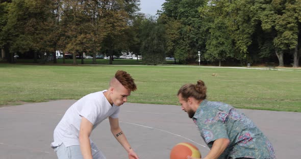 Two man playing basketball