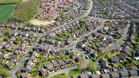 Aerial footage of a typical British residential housing  estate in the Village of Kippax in Leeds UK