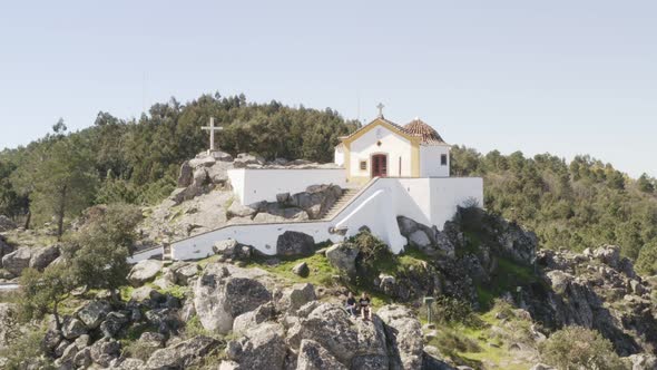 Aerial drone view of Ermida da Nossa Senhora da Penha in Serra de Sao Mamede mountain