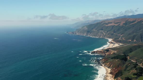 Inspiring View of the Mountainous Ocean Coastline Under the Clear Blue Sky. 