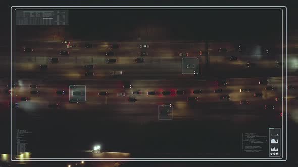 Top Down Footage of Traffic on Busy Multilane Road in City at Night