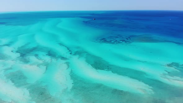 Aerial drone footage of the beautiful tropical beach at Little Stirrup Cay or CocoCay, Bahamas