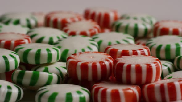Rotating shot of spearmint hard candies - CANDY SPEARMINT 087