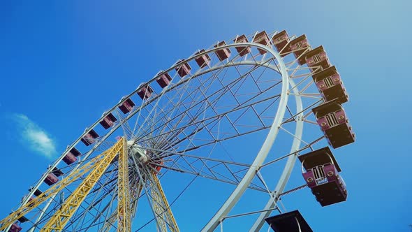 Large Ferris Wheel on a Blue Sky.