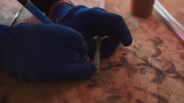 Male Hands in Gloves Preparing Neon Lightbulbs for Making Neon Close Up Shot Slow Motion