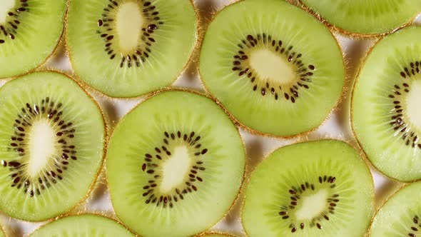 Macro Shot of Sliced Kiwi Fruit Slices and Rotate