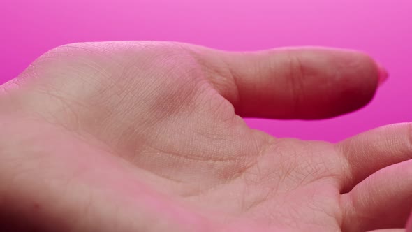 Hand Skin in Pink Neon Light Female Human Body Part and Ultraviolet Arm Surface Macro Shooting