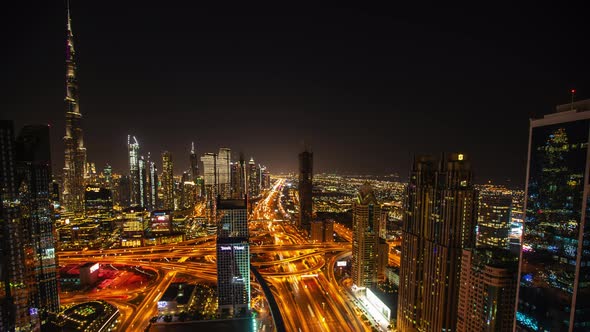 Night Timelapse of Tall Skyscrapers and Busy Highway Traffic in Dubai UAE