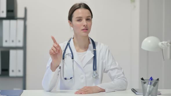 Finger Sign As No By Female Doctor