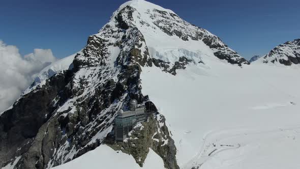 Aerial shot of Sphinx astronomical observatory above Jungfraujoch, Switzerland