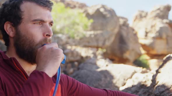 Mountaineer blowing the whistle after reaching