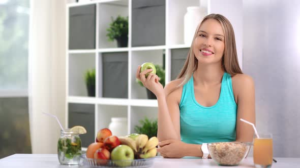 Portrait of Beautiful Happy Dietary Lady Surrounded By Appetizing Vegan Food and Drink