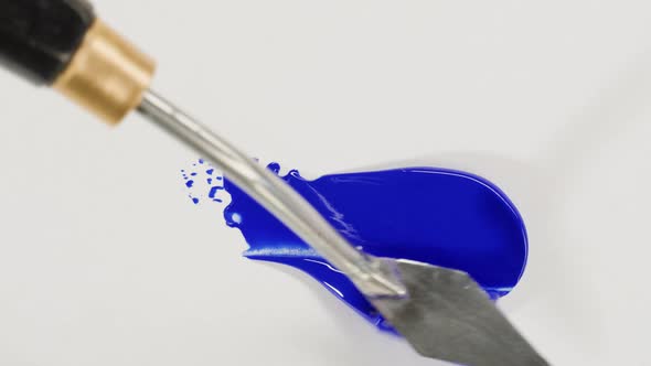 Mixing Blue Paint Closeup