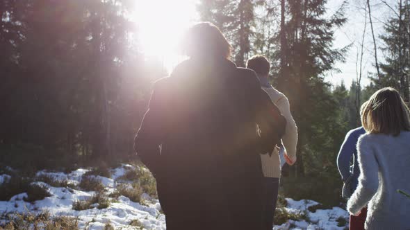 Friends running in the woods