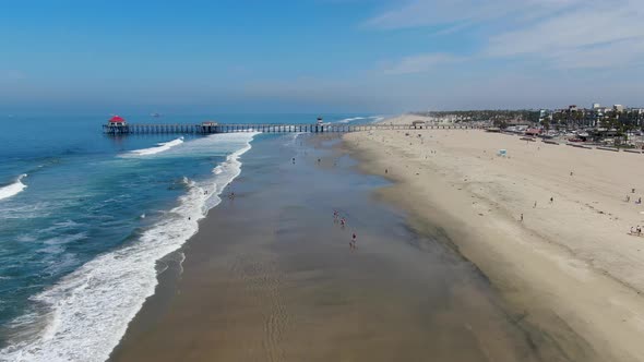 Aerial View of Huntington Pier, Beach and Coastline During Sunny Summer Day