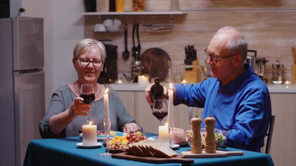 Senior Couple Having Fun Drinking