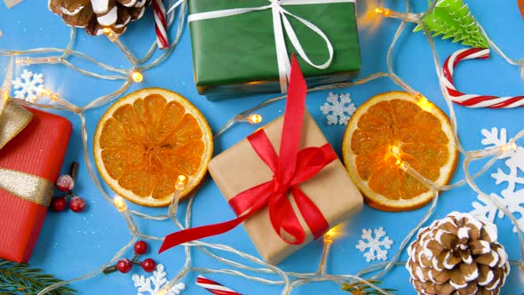 Christmas Gifts and Decorations on Blue Background 