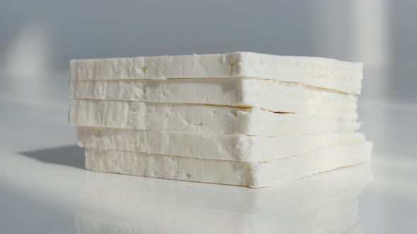 Stack of cow milk cheese  4K close-up video