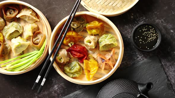 Oriental Traditional Chinese Dumplings Served in the Wooden Steamer