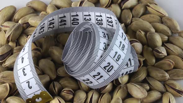Roasted Pistachio  And Tape Measure Turning 