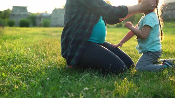 Summer Nature Happy Family Pregnancy Young Pregnant Woman Mother with Two Small Toddler Children Sit