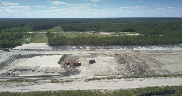 Sand Quarry with Machines Under People Control Aerial View