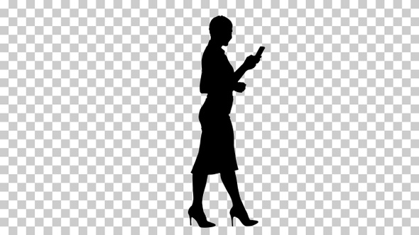 Silhouette Beautiful young woman is using an app in her