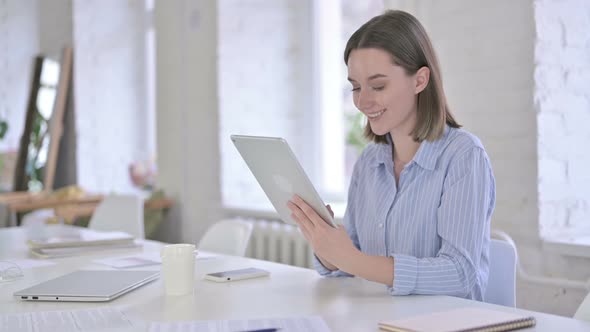 Happy Professional Young Woman Using Tablet