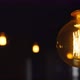 Big Vintage Incandescent Light Bulbs Hanging in the Dark Room - VideoHive Item for Sale