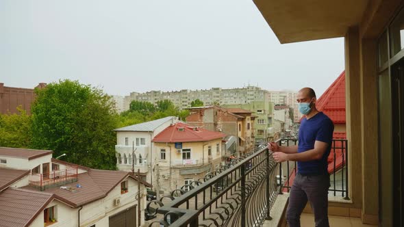 Man During Lockdown Taking a Breath of Fresh Air