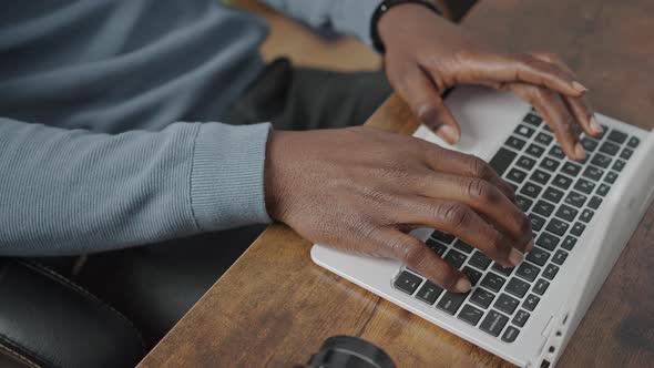 Man Typing on Computer's Keyboard  Home Office Concept