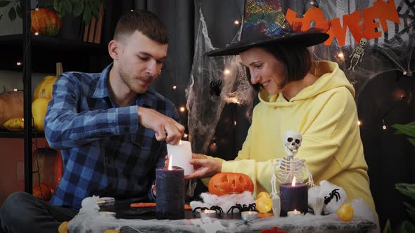 Halloween party. Happy young man and woman in halloween night.