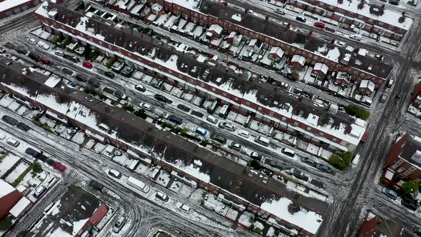 Aerial footage of a snowy winters day in the city of Leeds in the UK