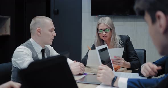 Beautiful Female Director Holds Business Meeting with Colleagues