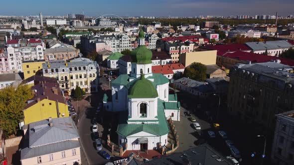 Aerial view of Church of St. Nikolay Pritisk and historical part of Kyiv - Podil