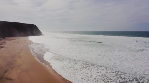 Praia Grande Beach at Sintra, Lisbon, Portugal, on the Atlantic Coast, a Beautiful Sandy Beach with