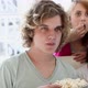 Three teenagers watching TV and eating popcorn - VideoHive Item for Sale