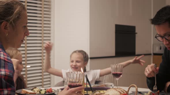 Happy family enjoy dinner together