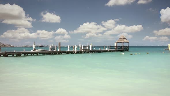 Empty Wood Pier at a Tropical Beach.