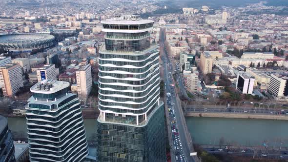 Skyscraper And Traffic Jam On The Bridge