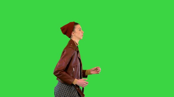 Girl Wearing Leather Jacket Running on a Green Screen Chroma Key