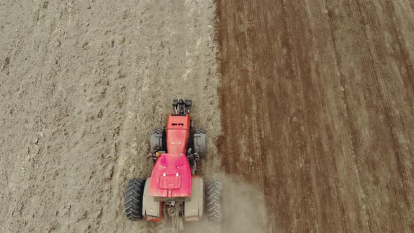 An Energy-saturated Tractor with a Trailed Tillage Unit Prepares the Soil for Sowing