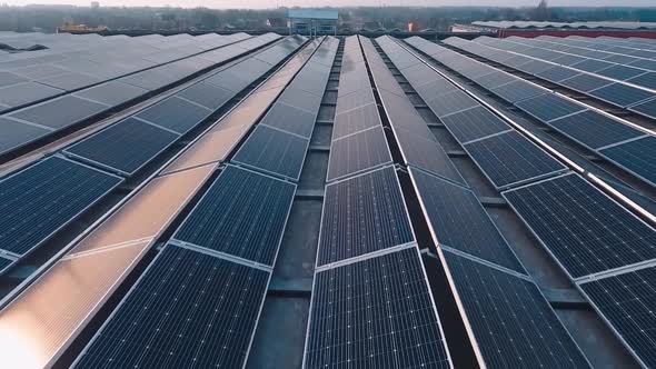 Rooftop solar energy. Aerial view of solar panels covering the whole roof of a building