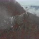 Aerial of Fog and Forest Mountain Cliffs - VideoHive Item for Sale