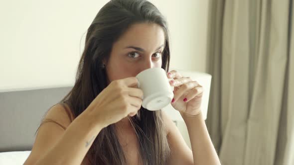 Woman drinking coffee