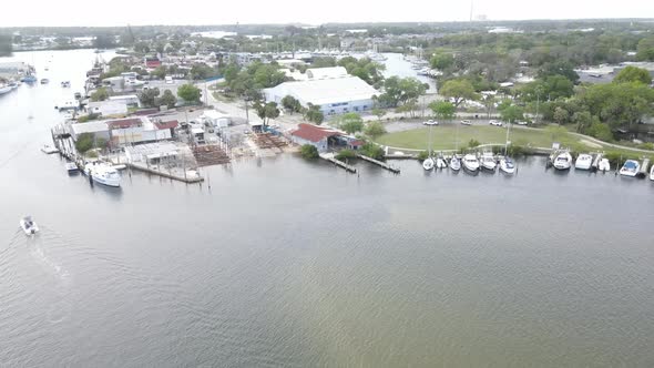 twisting aerial view of Tarpon Springs and the sponge docks the area is famous for.  The area is hom