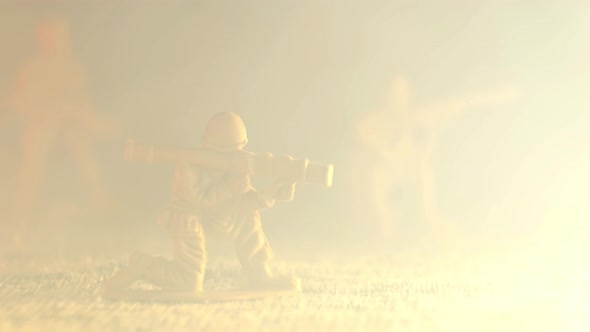 Smoke Envelops a Plastic Toy Soldier Grenade Launcher